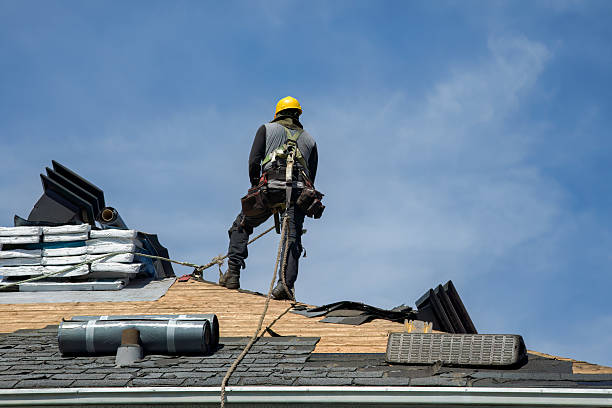 Professional Roof Replacement technician working in Minot AFB, ND